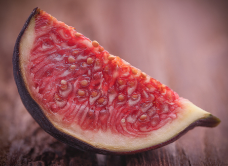 Fresh organic common fig on natural surfaceの写真素材