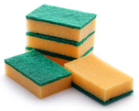 Kitchen sponge with scotch brite over white backgroundの写真素材