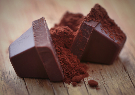 Cacao or cocoa powder on a natural surfaceの写真素材