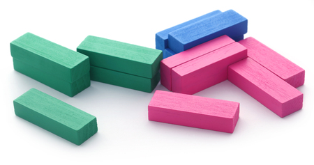 Colorful wooden blocks over white backgroundの写真素材
