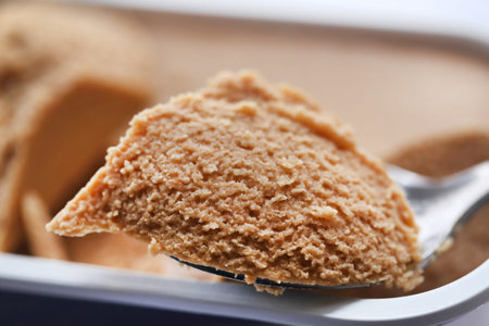 Canned egg of salmon with a spoon