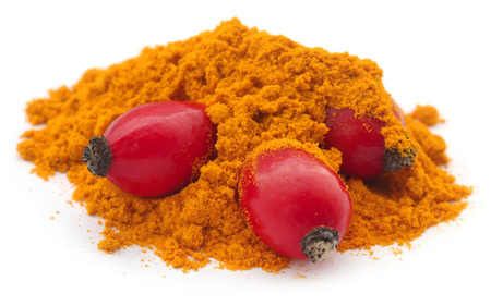 Rose hips with powder over white backgroundの写真素材