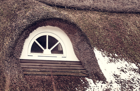 White window in a Danish house in winterの写真素材