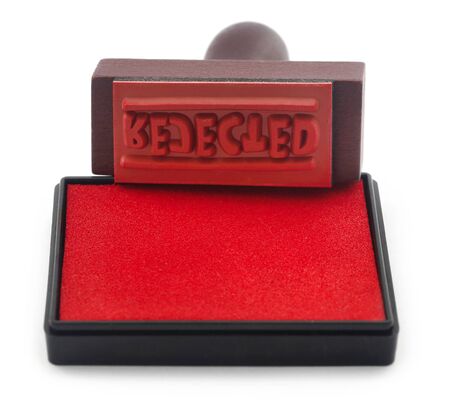 Rejected rubber stamp with pad over whiteの写真素材