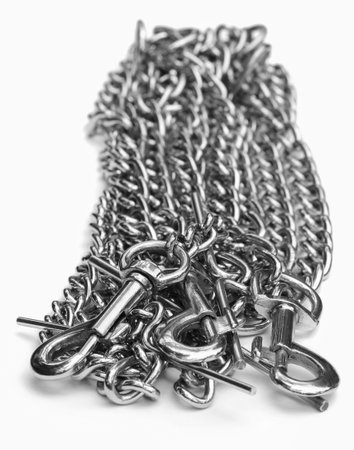 Metal chain for dog over white background