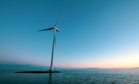 Wind power generation in Denmark near sunset