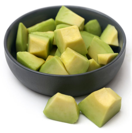 Fresh sliced avocado in a bowlの写真素材