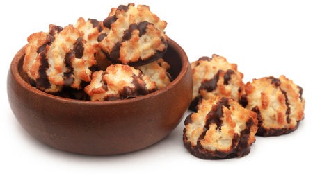 Tasty coconut chocolate cookies over white backgroundの写真素材