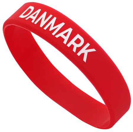 Red wristband or bracelet written Denamark in white lettersの写真素材