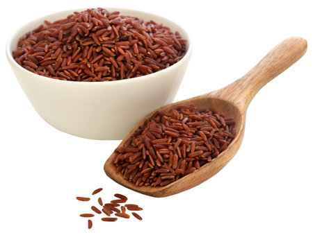 Red Jasmine rice in a wooden spoon and a bowlの写真素材