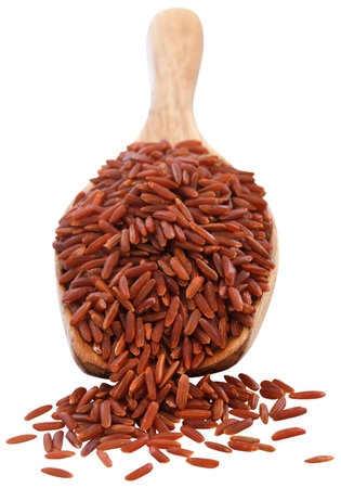 Red Jasmine rice in a wooden spoonの写真素材