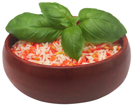 Lentil rice with fresh basil leaves in a bowlの写真素材