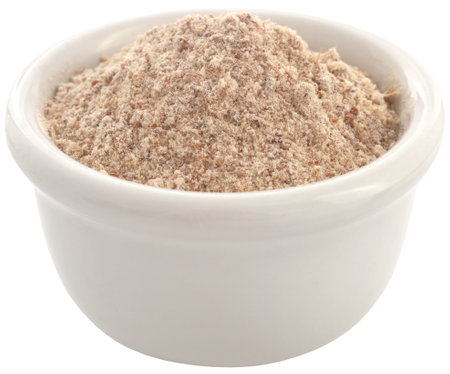 Aritha or Sapindus mukorossi powder in ceramic bowlの写真素材
