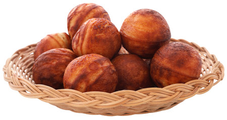 Popular Dansih pancake balls or aebleskiver in a basketの写真素材