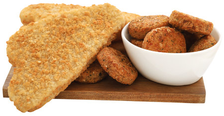 Crispy fish fillet with vegetable falafel closeup anb isolatedの写真素材