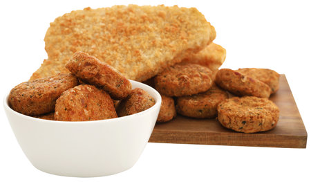 Crispy fish fillet with vegetable falafel closeup anb isolatedの写真素材