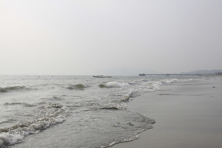 Waves and wet beachの写真素材