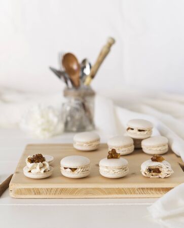 Pastel macarons on a plateの写真素材