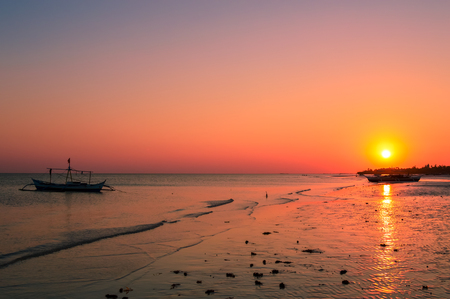 Stunning sunset over Bantayan Island, Cebu, Philippinesの写真素材