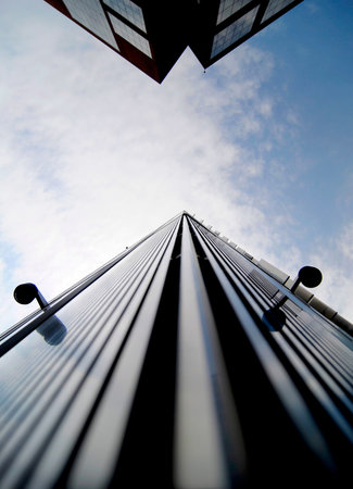 LOWER MANHATTAN, NEW YORK CITY, USA - JULY 14, 2014 : Low angle view of two buildings that are...