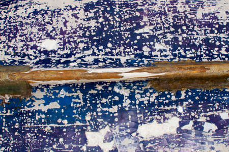 Picture of a cracked resin texture of the hull of an abandoned boat at Sanur Beach in Bali, Indonesiaの写真素材