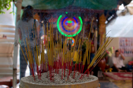 PHNOM PENH, CAMBODIA - 13th DECEMBER 2018 : Close up picture of many burning incense sticks at Wat Phnom in Phnom Penh, Cambodiaのeditorial素材