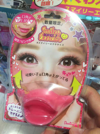 Kobe, Hyogo, Japan - 15th November 2018 : A really weird and funny Japanese expression muscle exerciser product that helps to have a better smile, captured in a supermarket in Kobe, Japanのeditorial素材