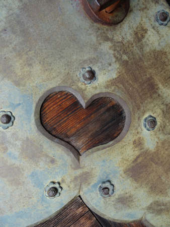 Close up picture of a beautiful iron detail with a hear shaped frame located on an entrance door at the Todai-ji temple in Nara, Japanのeditorial素材