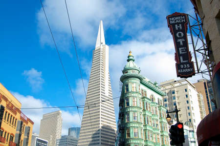 San Francisco, California, USA - 20th May 2015 : View on the famous Transamerica Pyramid building and the Columbus Tower in San Francisco, USAのeditorial素材