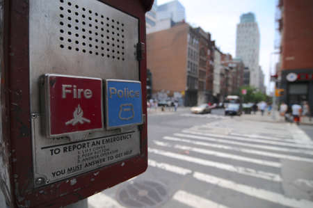 Brooklyn, New York City, USA : 14th July 2014 : Close up picture of a Fire and Police Emergency call box with some buildings in the background located in Brooklyn, NYC, USAのeditorial素材