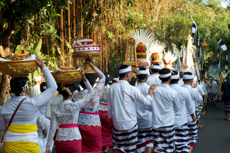 Ubud, Bali, Indonesia - 15th May 2019 : Picture of Balinese women and men walking during a...