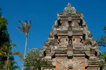 Low angle view on the beautiful stone gate at Ubud Royal Palace complex (Puri Saren Agung) located in Ubud, Bali - Indonesiaのeditorial素材