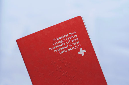 Front view of one Swiss passport with white background