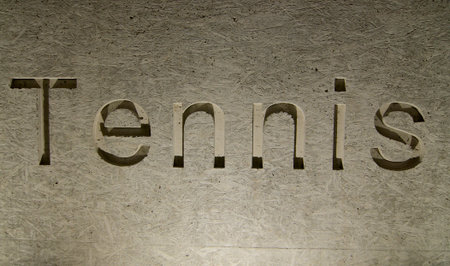 Illuminated Tennis inscription engraved in stone