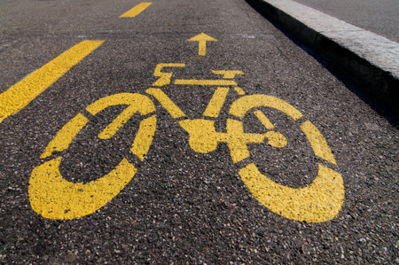 Low angle view of a bicycle path symbol drawn on a street in Lugano, Switzerland