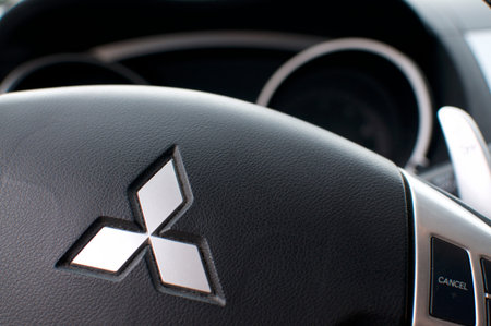 Bioggio, Ticino, Switzerland - 28th July 2019 : Logo of Mitsubishi on a steering wheel