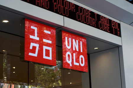 Brisbane, Queensland, Australia - 19th November 2019 : View of an Uniqlo hanging on a glass wall at...