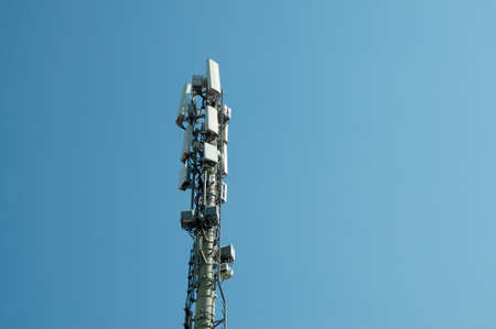 Telecommunication tower antenna of 4G and 5G mobile communication system located in Taverne, Switzerlandの写真素材