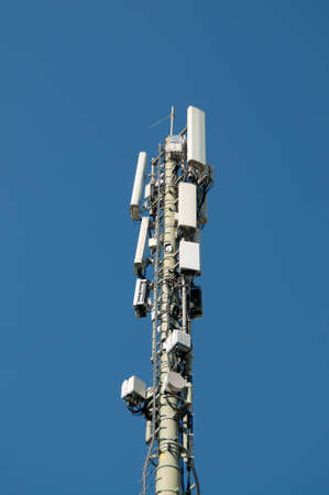 Telecommunication tower antenna of 4G and 5G mobile communication system located in Taverne, Switzerlandの写真素材