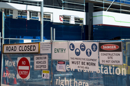Various warning of no entry, road closed, and danger signs on a construction site in Brisbane, Australiaの写真素材
