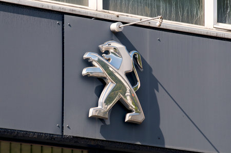 Taverne, Ticino, Switzerland - 9th May 2020 : Peugeot sign located on a garage exterior in Taverne, Switzerland. Peugeot is a French automotive manufacturer, part of Groupe PSAのeditorial素材