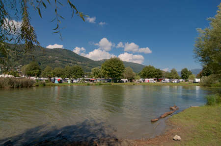 View on the gulf of a Agno and a camping site located in the Ticino Canton, Switzerlandの写真素材