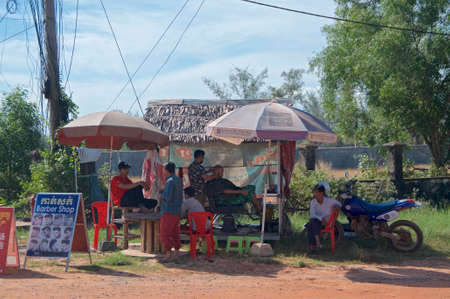 Otres Beach, Sihanoukville, Cambodia - 30th December 2018 : Typical open air barber shop located in the village of Otres in Cambodiaのeditorial素材