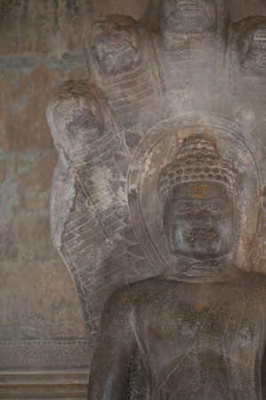 Close up of beautiful stone Buddha statue in the Angkor Wat building temple in Siem Reap, Cambodiaの写真素材