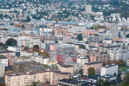 View over the the city of Lugano seen from Parco San Michele in the morning