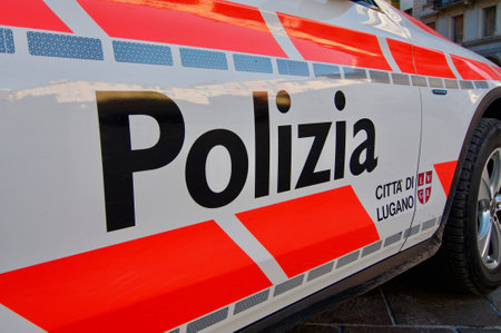 Lugano, Ticino, Switzerland - 14th January 2021 : Close up of Polizia CittÃ  Lugano (Police city of Lugano) inscription on a car doorのeditorial素材