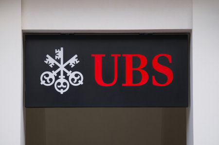 Lugano, Ticino, Switzerland - 12th January 2021 : UBS Bank logo sign hanging on a building facade in Lugano. UBS is one of the leading banks in Switzerland and in the worldのeditorial素材