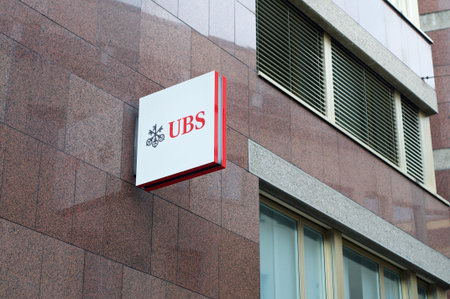 Lugano, Ticino, Switzerland - 12th January 2021 : UBS Bank logo sign hanging on a building facade in...