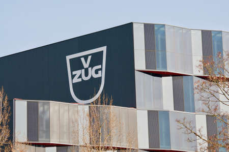 Zug, Switzerland - 26th February 2021 : V-Zug AG company sign at the headquarters building in Zug, Switzerland. V-Zug is Swiss manufacturer of home appliancesのeditorial素材