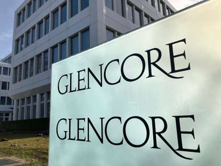 Zug, Switzerland - 26th February 2021 : Sign of Glencore company headquarters building in Zug, Switzerland. Glencore is one of the largest commodities trading and mining firm in the worldのeditorial素材